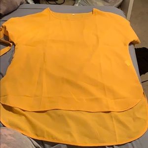Mustard blouse with tie sleeves